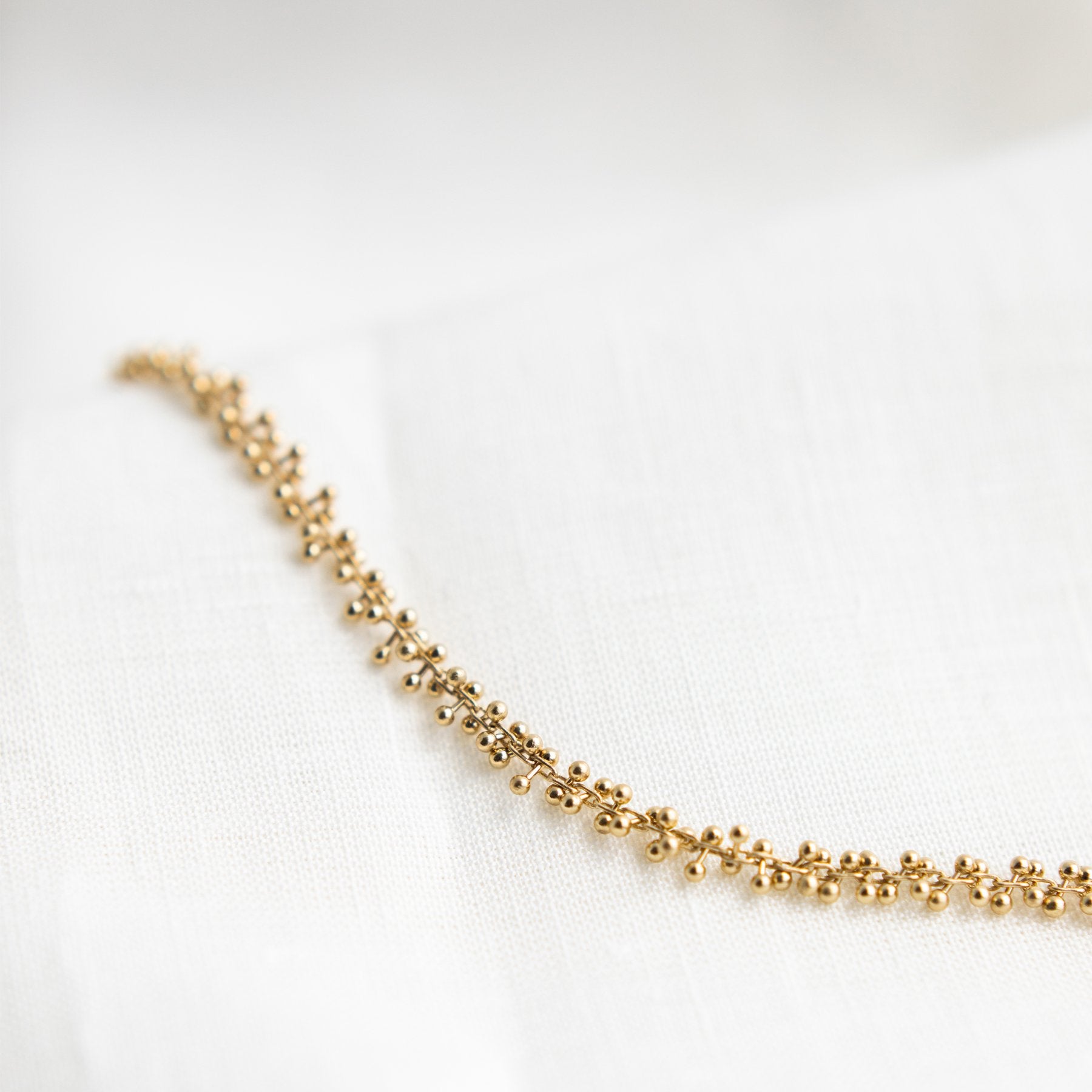 gold bracelet, sustainably and ethically made