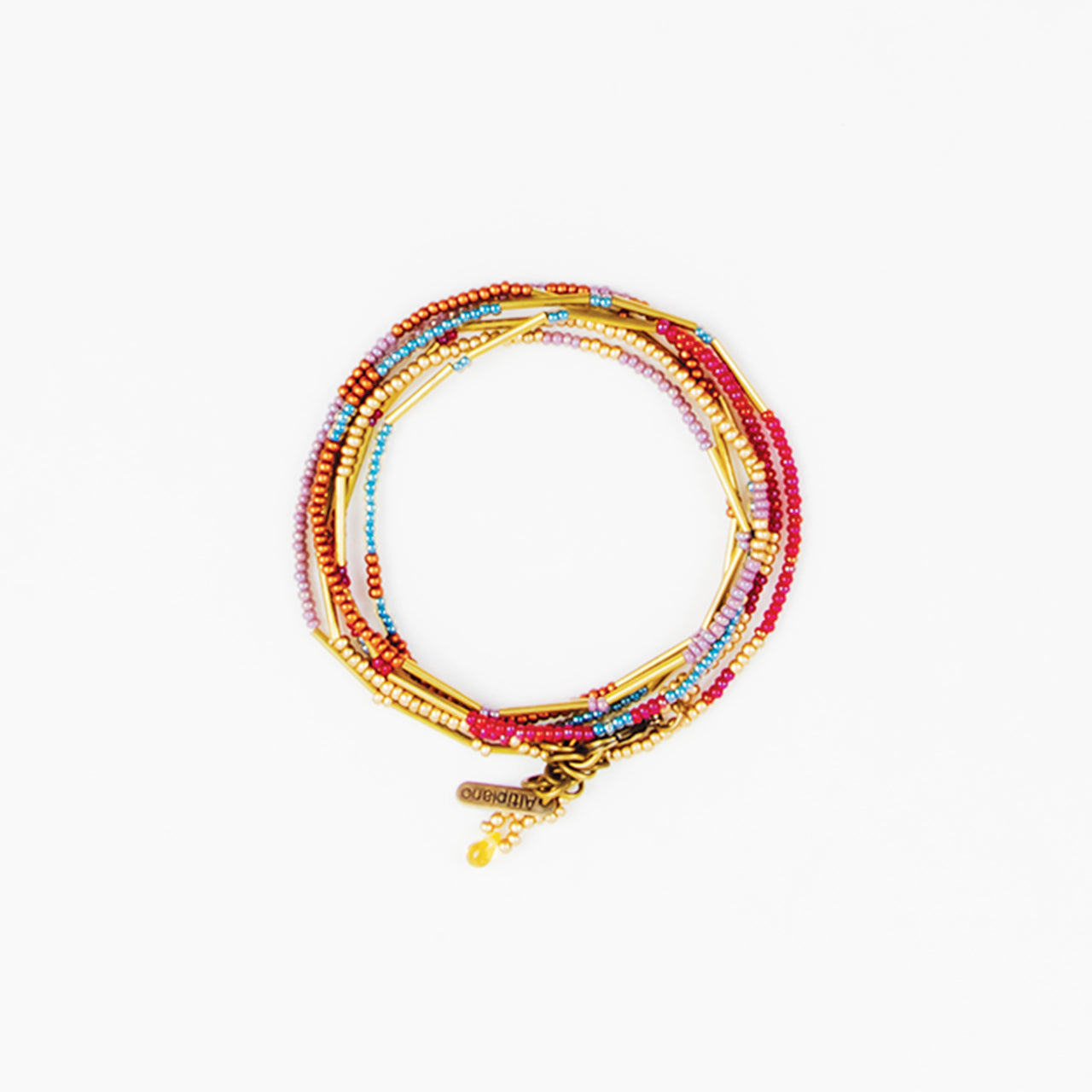 brass and bead necklace and wrap bracelet, altiplano, sustainably and ethically made, pink, turquoise, gold, orange and red