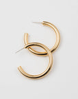 brenda grands jewelry, gold hoop earrings, tube hoops. womens jewelry, fashion jewelry, ethically made, handmade, sustainable fashion, curate