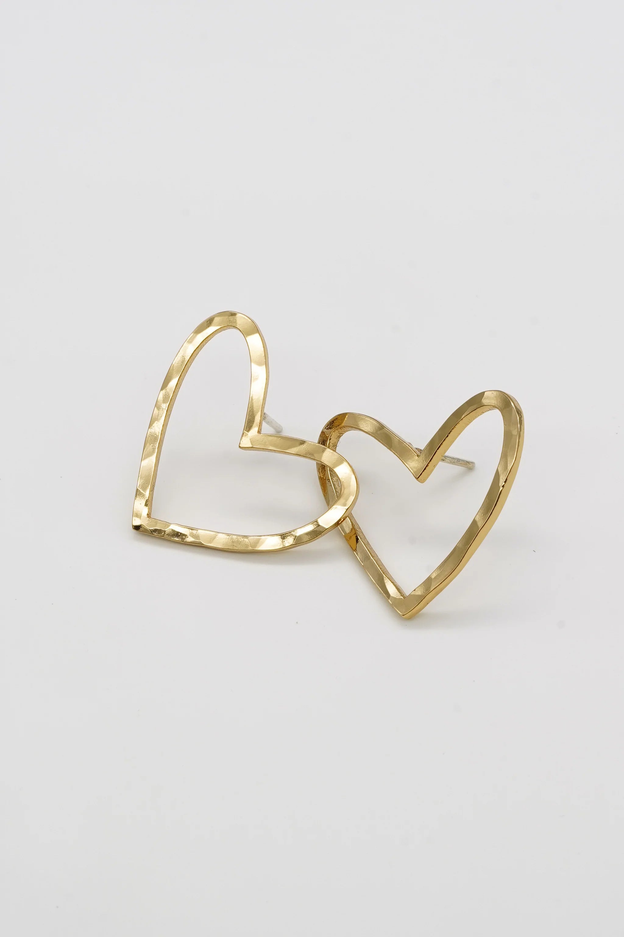brenda grands jewelry, heart shaped earrings, sealed with love heart studs, gold earrings, ethically made, curate