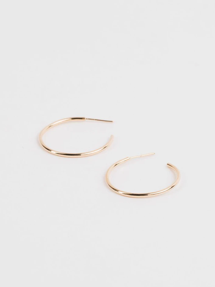 curate, laude the label, sustainable and ethically made womens fashion jewelry, gold everyday hoop earrings, simple hoop earrings, thin hoop earrings, medium sized womens hoop earrings, fashion jewelry