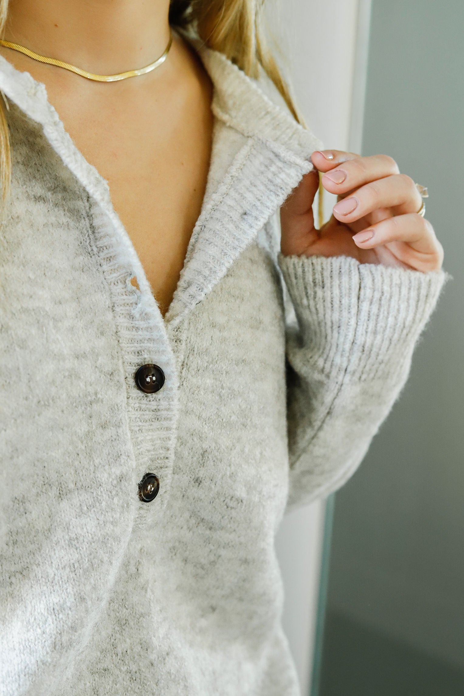 curate, poems bcn, sustainable and ethically made womens apparel and sweaters, light grey pullover sweater with buttons, roundneck sweater, soft womens sweater, sweater weather, fall and winter style, womens fashion retailer