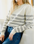 curate, laura laval paris, paisian womens apparel brand, sustainable and ethically made womens apparel and fashion, beige and navy blue striped sweater, striped sweater, womens striped sweater, high quality, made in france, womens sweaters, sweater weather