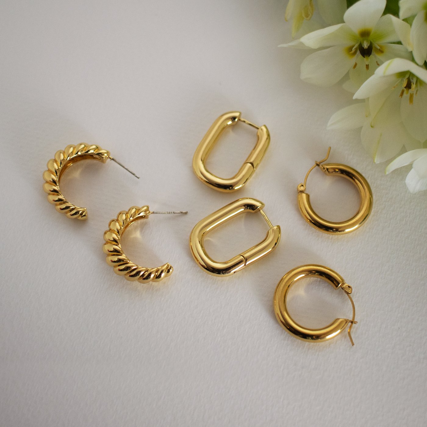 curate, siizu, sustainable and ethically made fashion jewelry, womens twisted gold hoop earrings, womens hoop earrings, gold hoop earrings, medium sized hoop earrings, fashion jewelry